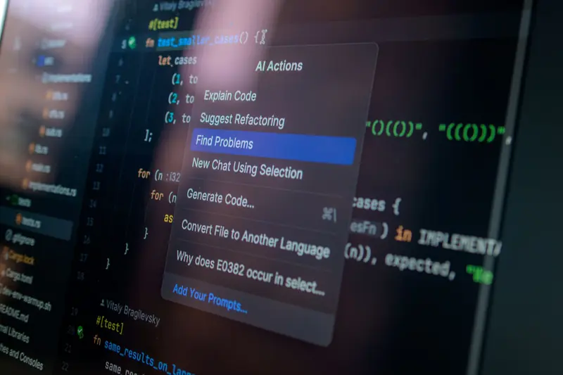 Detailed view of a computer screen displaying code with a menu of AI actions, illustrating modern software development.